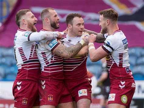 who are wigan warriors playing this week